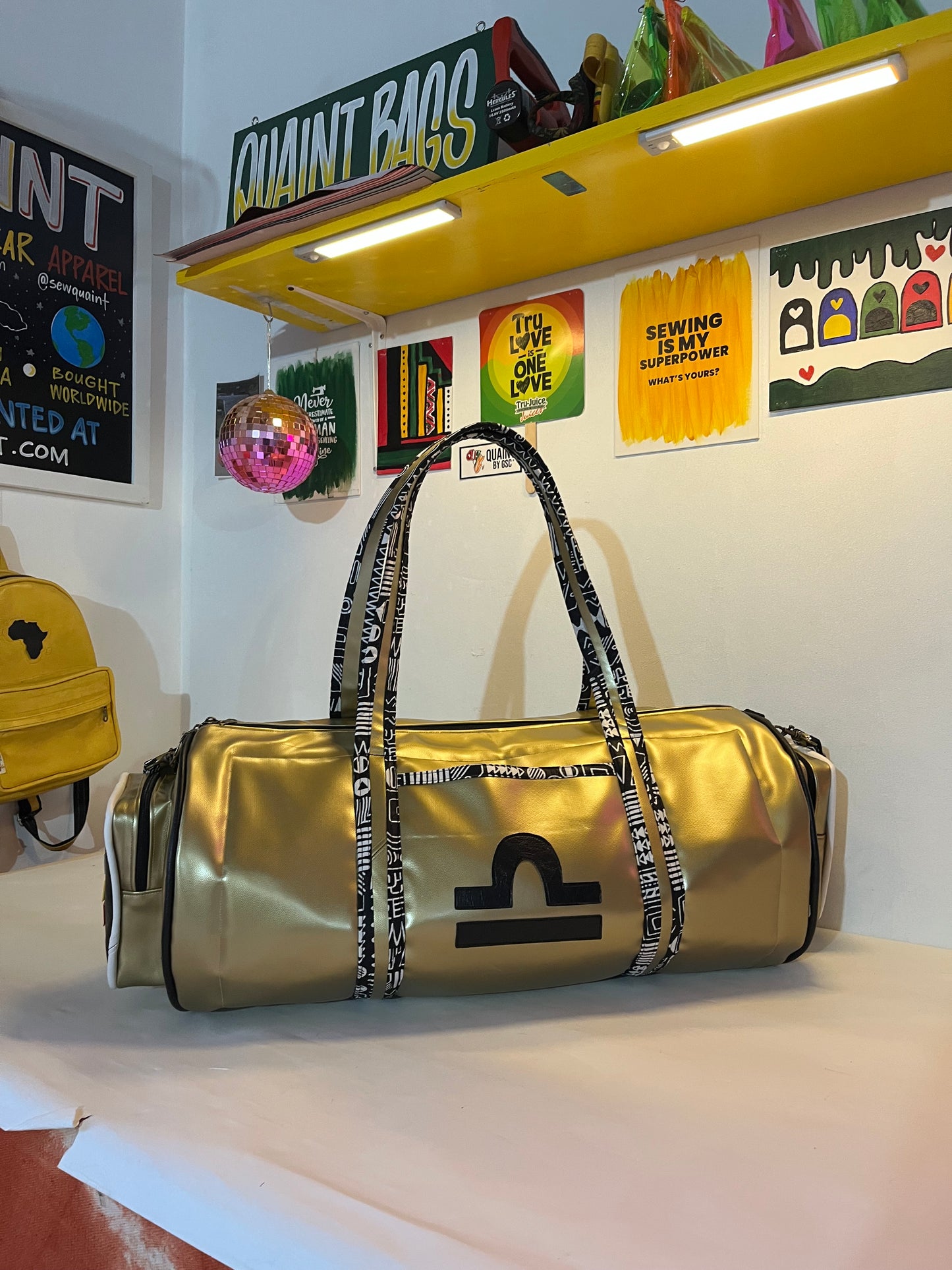 TIME CAPSULE DUFFLE BAG: Gold