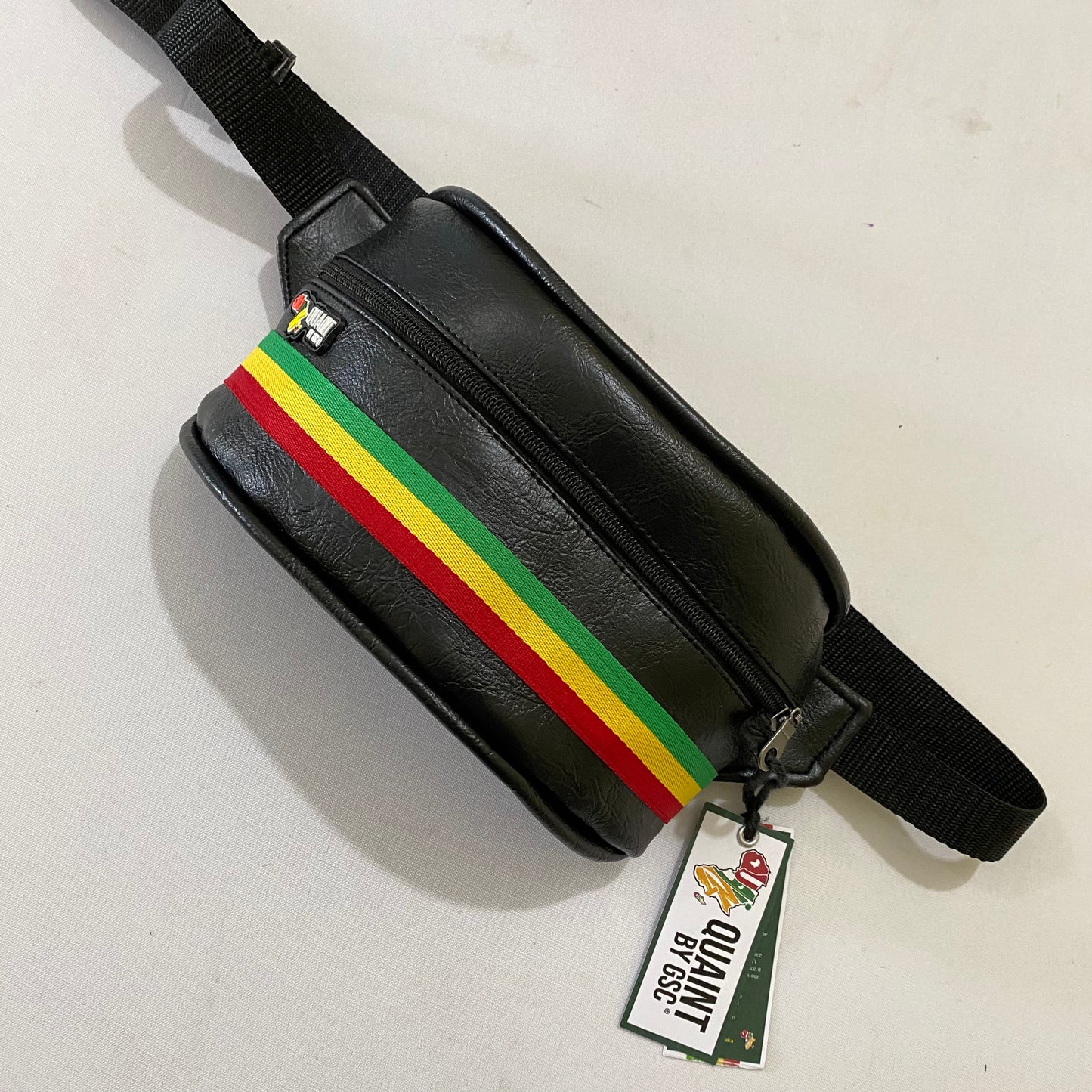 slow fashion clothes, ethical fashion, handmade fashion, backpack, book bag, handmade backpack, reggae backpack, leatherette bag, bag made in jamaica, caribbean products, sew quaint, quaint bags