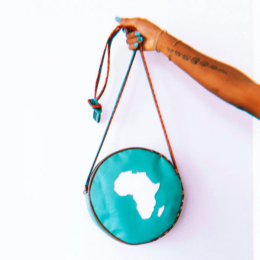 aquamarine circle bag made with leatherette and dashiki african print fabric. Macaroon Circle Bag.