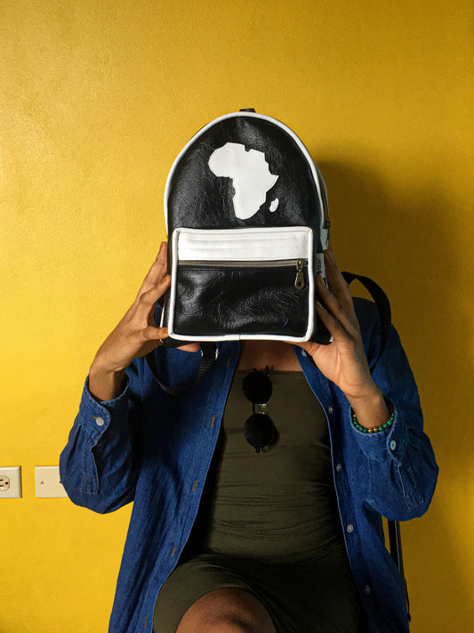 black leatherette backpack with map of africa outline on the front motherland backpack.