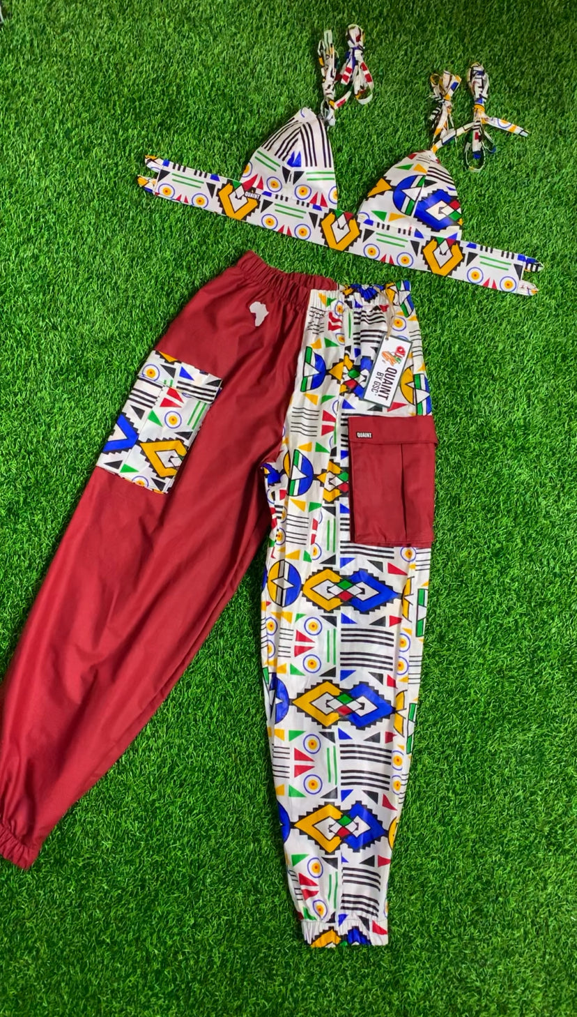 asili jjoggers made by sew quaint with african fabric and solid cotton fabrics with cargo pockets elastic waistbands and elastic hems and sideseam pockets ankara fabric ankara lovers made in jamaica worldwide shipping