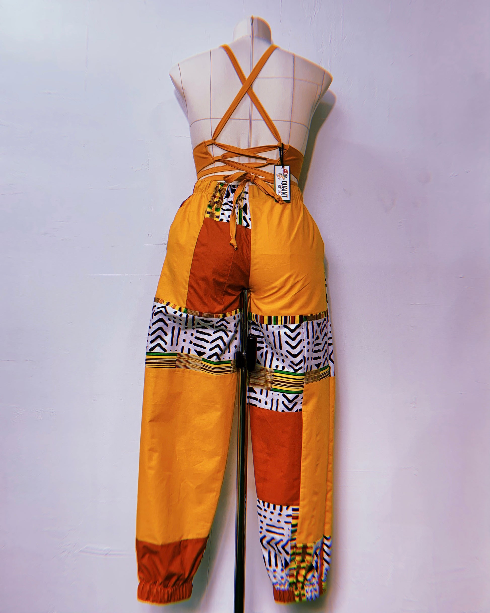 asili jjoggers made by sew quaint with african fabric and solid cotton fabrics with cargo pockets elastic waistbands and elastic hems and sideseam pockets ankara fabric ankara lovers made in jamaica worldwide shipping